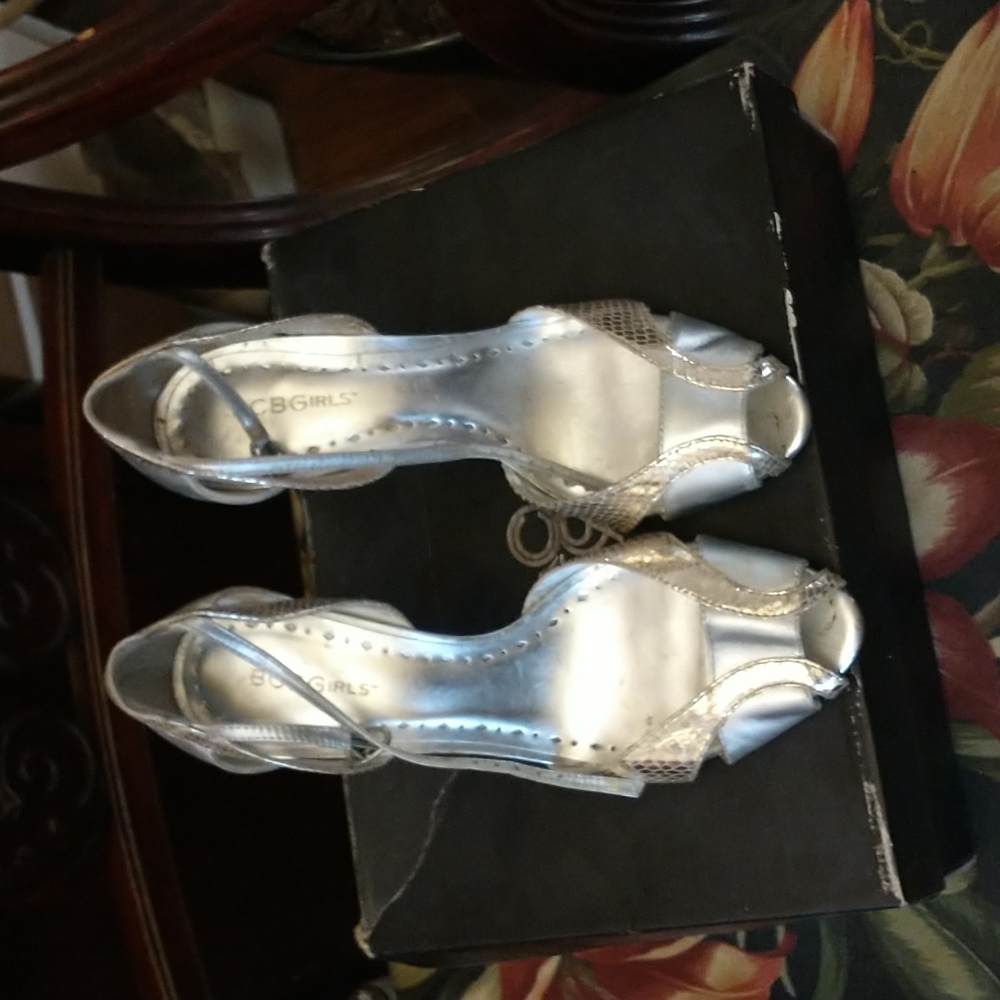 Used prom heels. Gold and silver wraps around ankle.